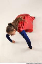 VIKY SUPERGIRL KNEELING POSE 2